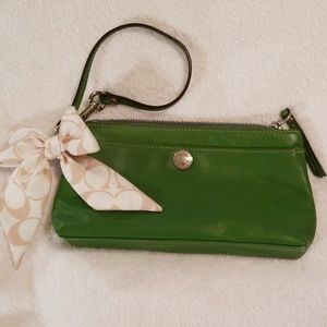 Cute green leather Coach wristlet w logo bow